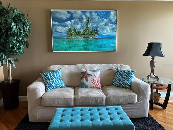 a kitchen with stainless steel appliances granite countertop a refrigerator a stove and a sink