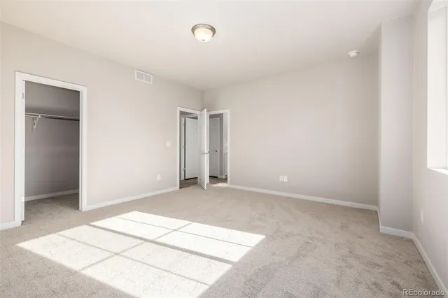 an empty room with a natural light