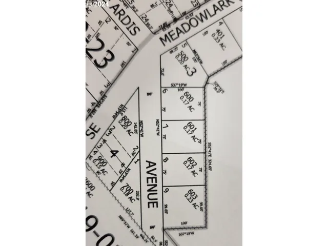 a bathroom with a blue wall