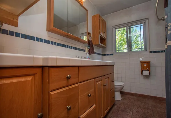 a close view of a sink and a window