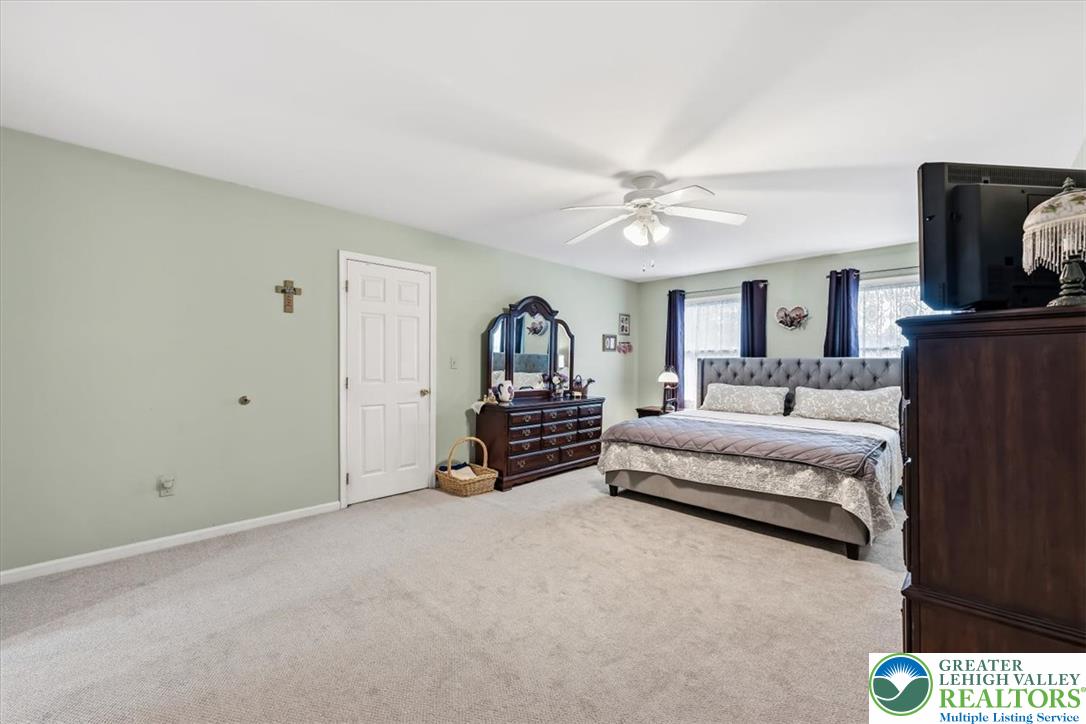 2011 Fieldview Drive Nazareth, PA 18064 - Photo 20 of 52 A spacious sleeping area with broad windows provides ample natural light and comfort.