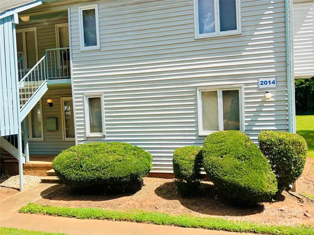 a view of a backyard of the house
