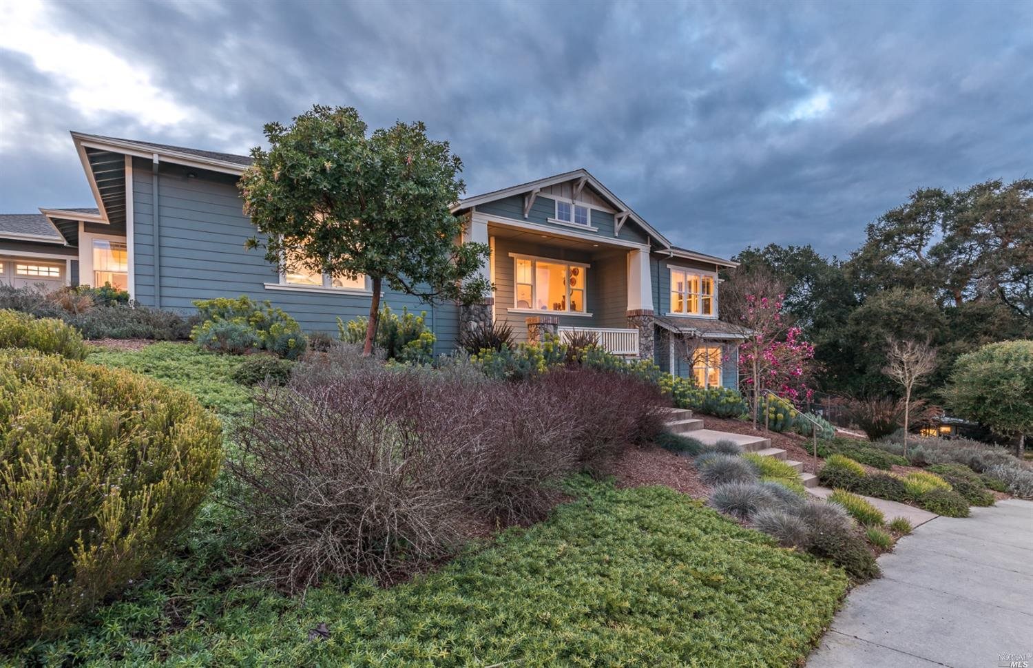 18 Wallenberg Way Petaluma, CA 94952 - Photo 1 of 1 a front view of a house with garden