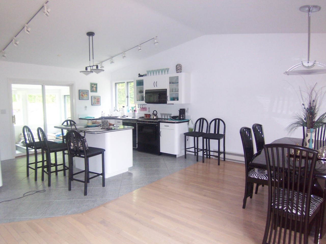 962 Plumb Road Becket, MA 01223 - Photo 3 of 7 a large kitchen with a table and chairs
