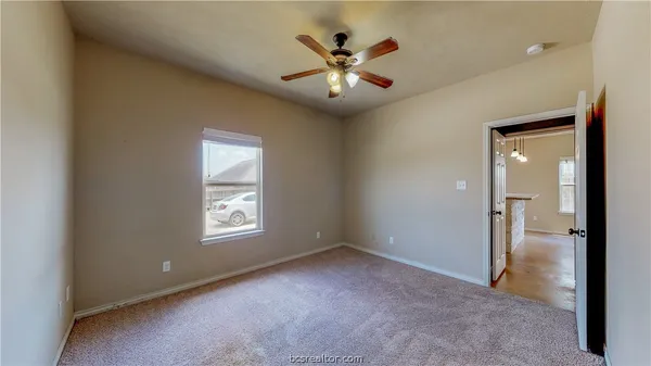 an empty room that has a window