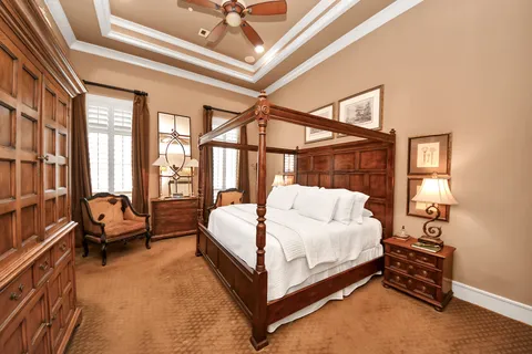 a bed room with a bed and a couch