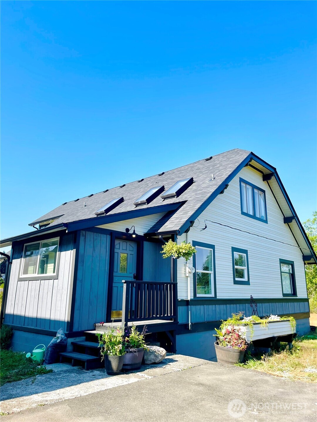 a front view of a house with yard