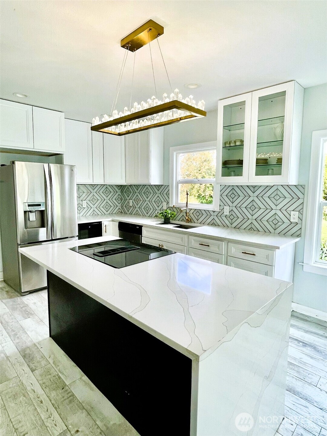 24507 Meridian East Graham, WA 98338 - Photo 5 of 38 a kitchen with a sink and a stove