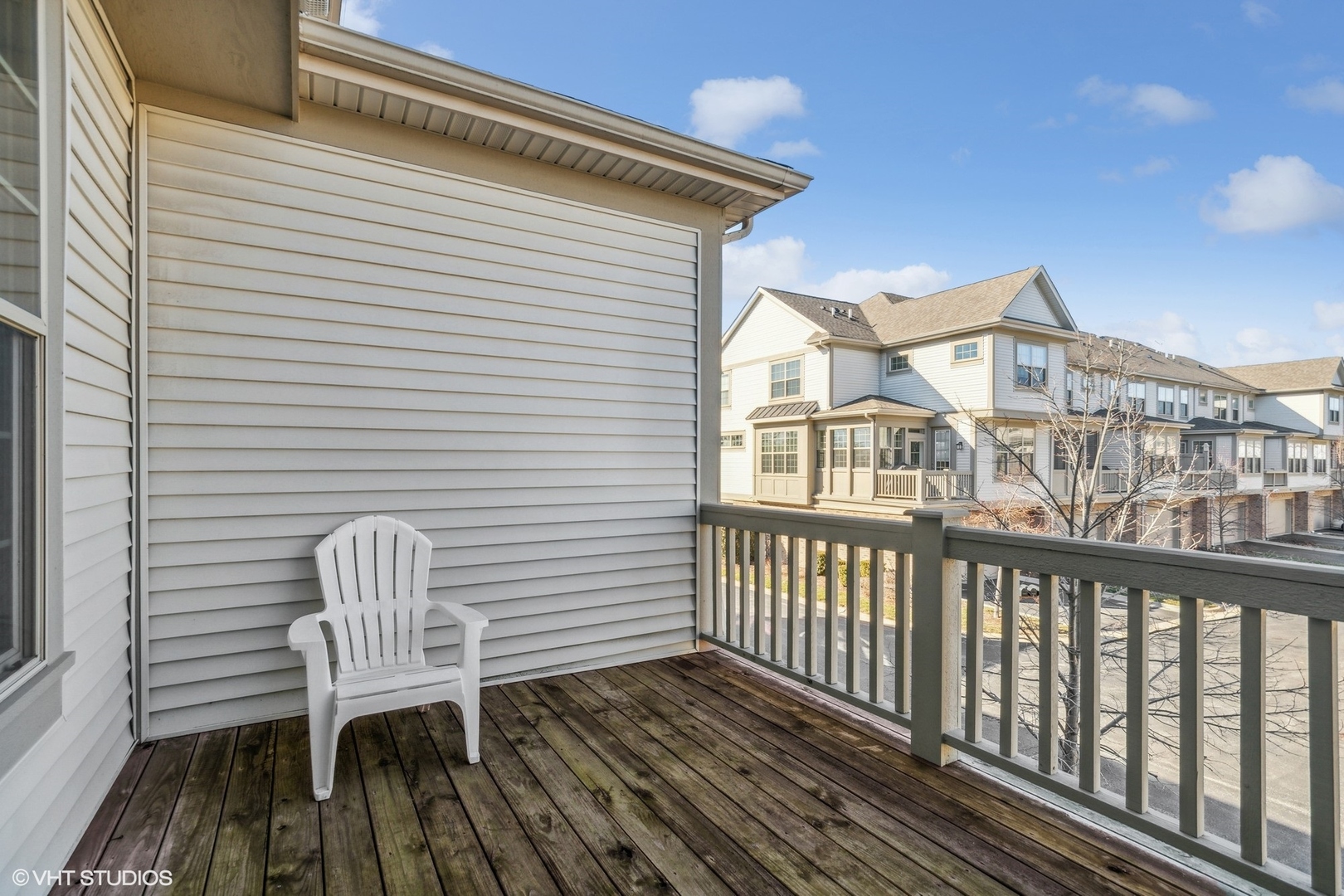 1908 Dauntless Drive Glenview, IL 60026 - Photo 11 of 24 a view of a chair and table in the balcony