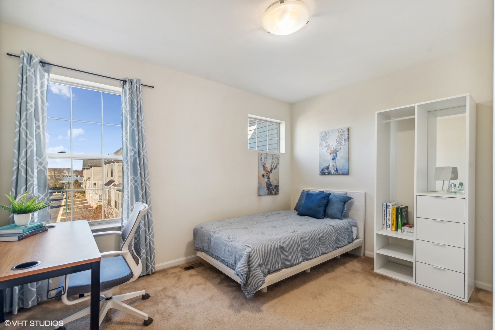 1908 Dauntless Drive Glenview, IL 60026 - Photo 16 of 24 a bedroom with a bed chair and a window