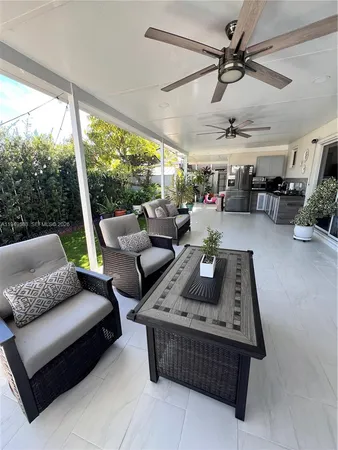 a living room with furniture and a table