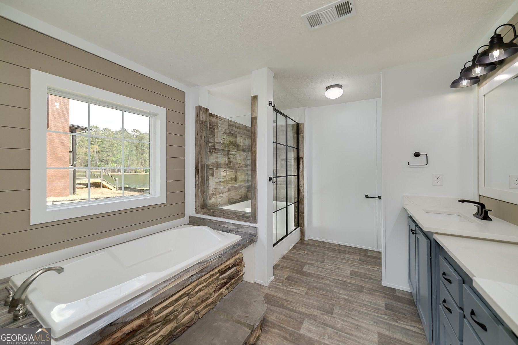 595 Barnetts Bridge Road Jackson, GA 30233 - Photo 29 of 47 a room with a bed and a window