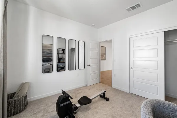 a room with window and closet