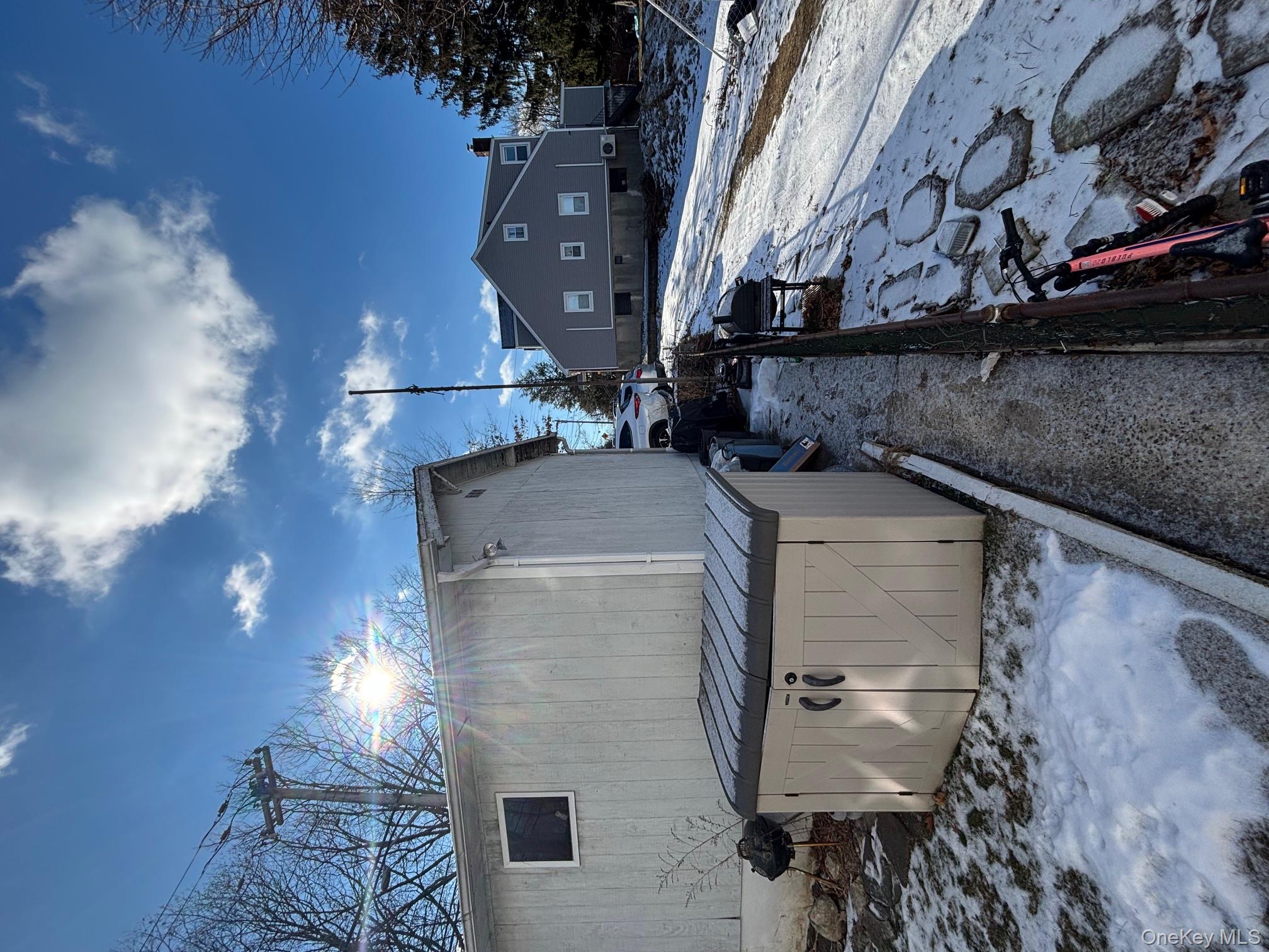 80 Palmer Road Yonkers, NY 10701 - Photo 11 of 12 a view of a backyard with sitting area