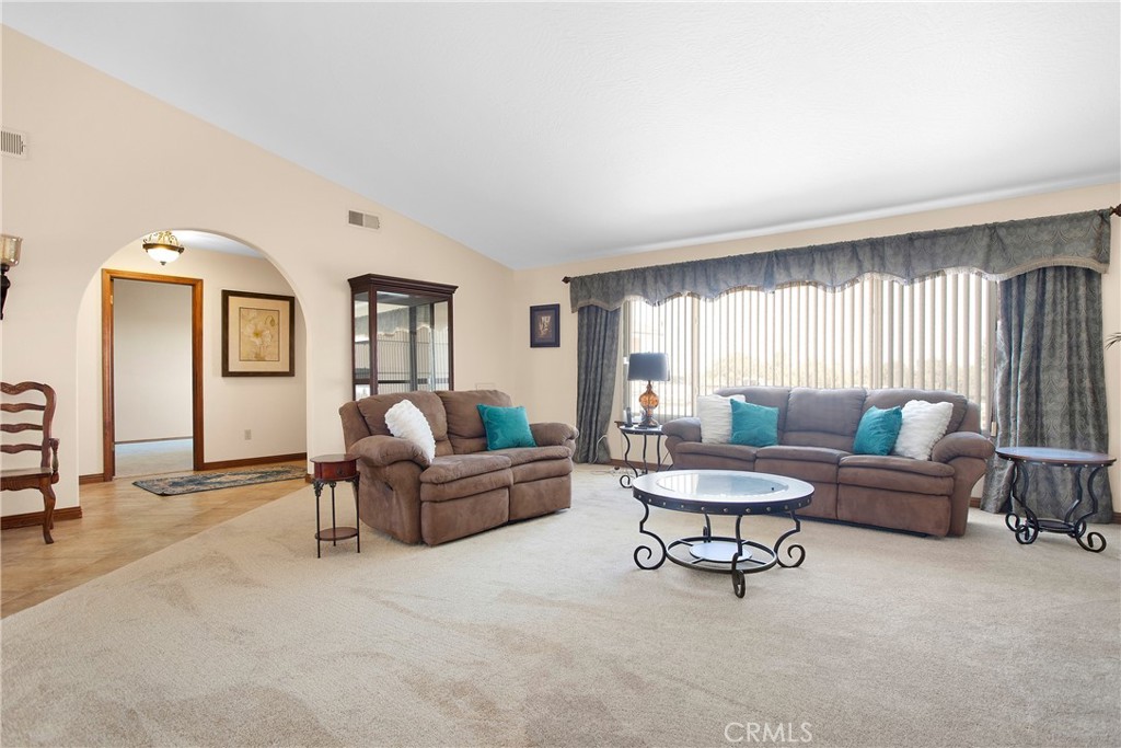 9275 Rattlesnake Road Phelan, CA 92371 - Photo 16 of 68 a living room with furniture and a window