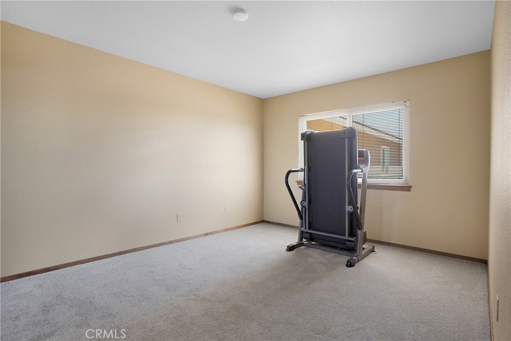 9275 Rattlesnake Road Phelan, CA 92371 - Photo 26 of 68 a view of a room with gym equipment