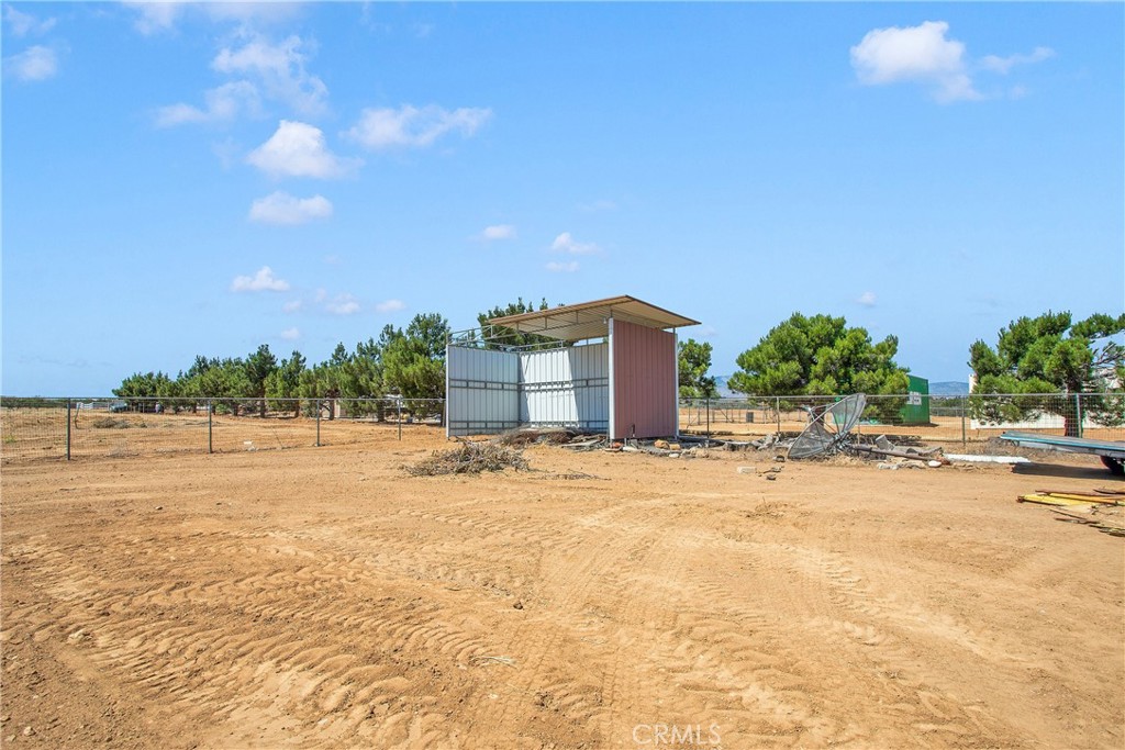 9275 Rattlesnake Road Phelan, CA 92371 - Photo 55 of 68 a swimming pool with an outdoor space and seating area
