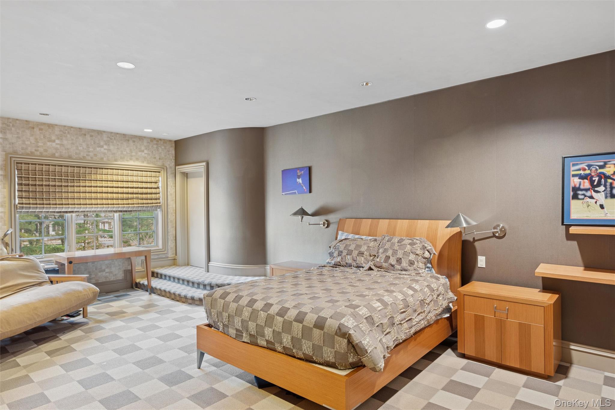 22 Willow Road Woodmere, NY 11598 - Photo 12 of 27 a bedroom with a bed and glass window