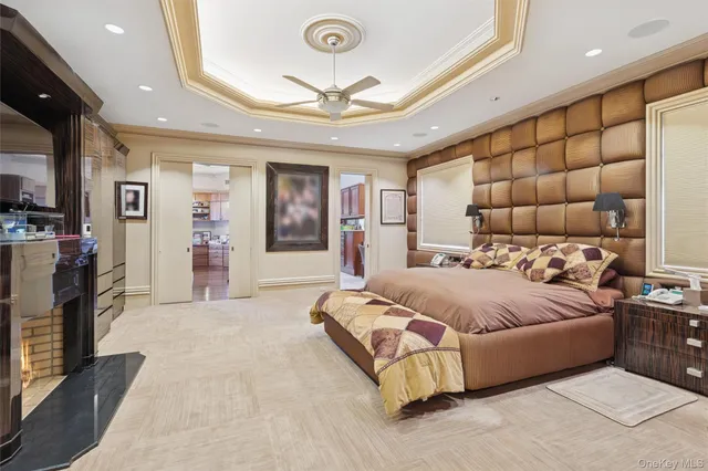a spacious bedroom with a bed and a walk in closet