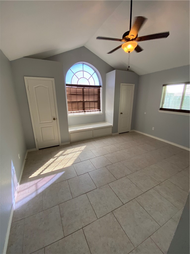 15517 Cruiser Street, Unit B Corpus Christi, TX 78418 - Photo 12 of 25 a view of an empty room with a window