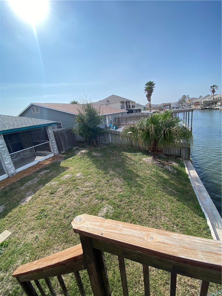 15517 Cruiser Street, Unit B Corpus Christi, TX 78418 - Photo 21 of 25 a view of a lake from a balcony