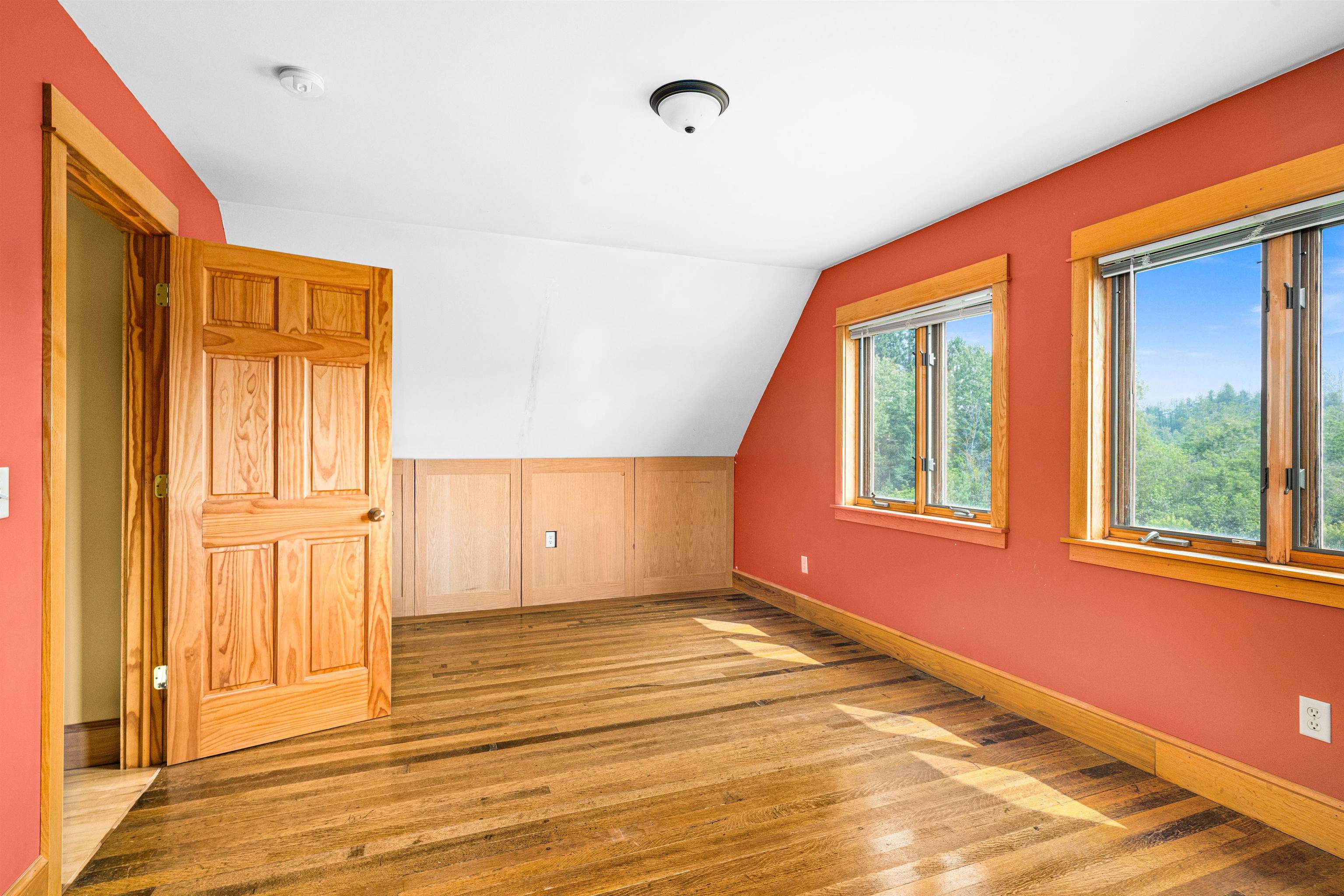 374 Nelson Road Cloquet, MN 55720 - Photo 20 of 33 Additional living space with light wood-type flooring and vaulted ceiling