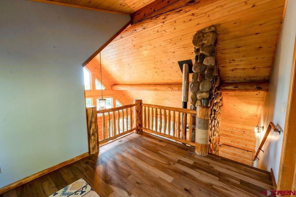 19595 Surface Creek Road Cedaredge, CO 81413 - Photo 10 of 28 a view of a balcony with wooden floor