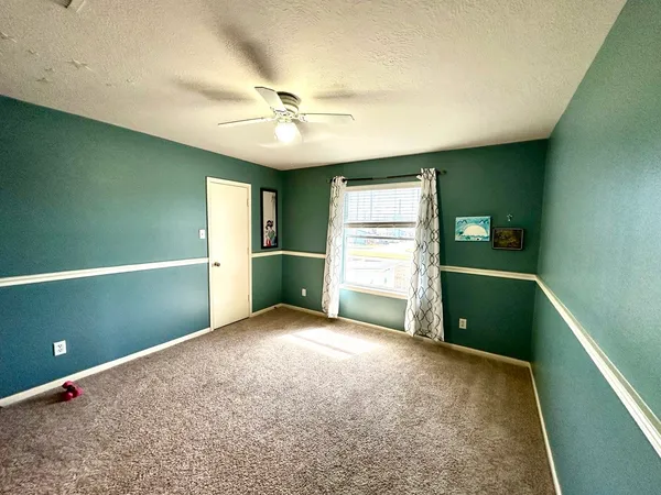 a view of a kitchen with a sink and a kitchen