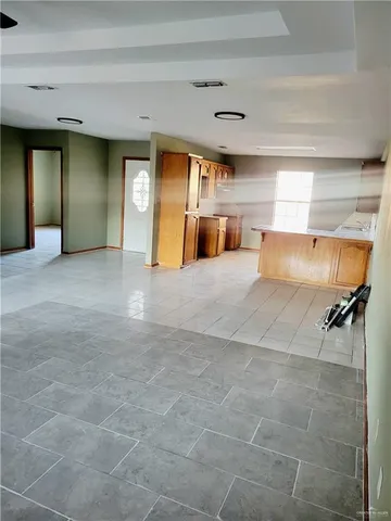 a view of a livingroom with furniture and windows