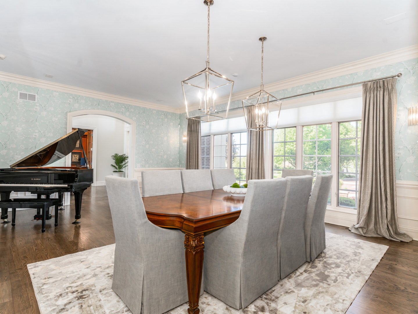 4N881 Old Farm Road St. Charles, IL 60175 - Photo 8 of 66 a dining room with furniture wooden floor a rug and a chandelier