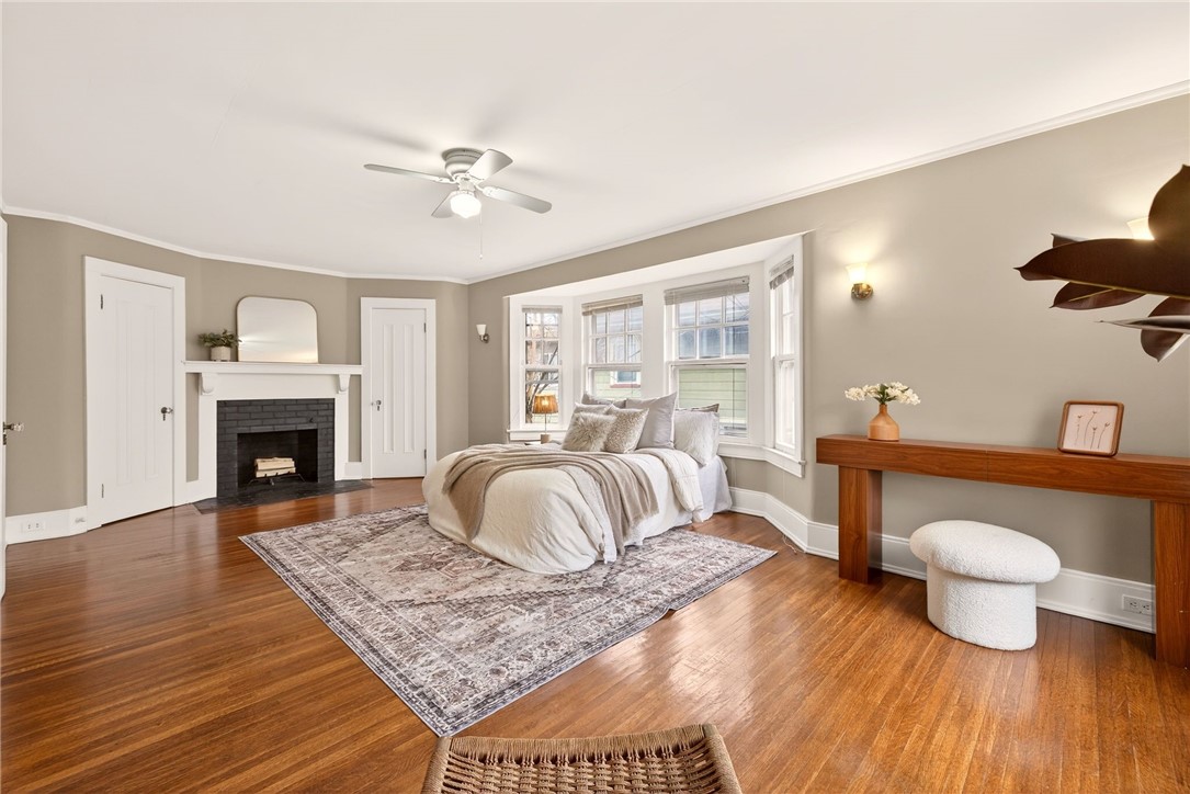 1005 Harvard Street Rochester, NY 14610 - Photo 26 of 50 Primary suite with decorative fireplace