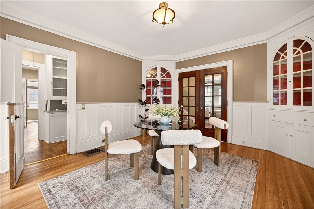 1005 Harvard Street Rochester, NY 14610 - Photo 10 of 50 Formal dining room with corner built-ins and dutch