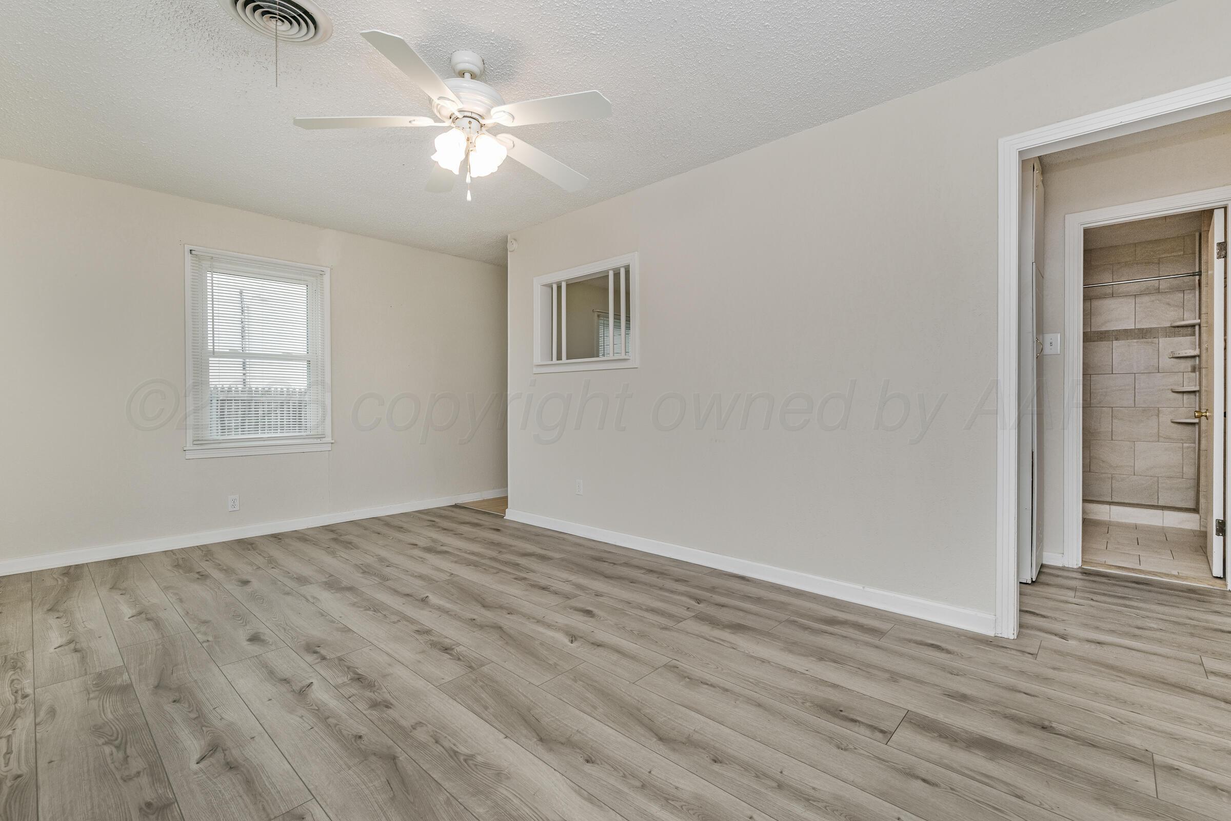 4619 South Ong Street Amarillo, TX 79110 - Photo 3 of 15 Living Room 1