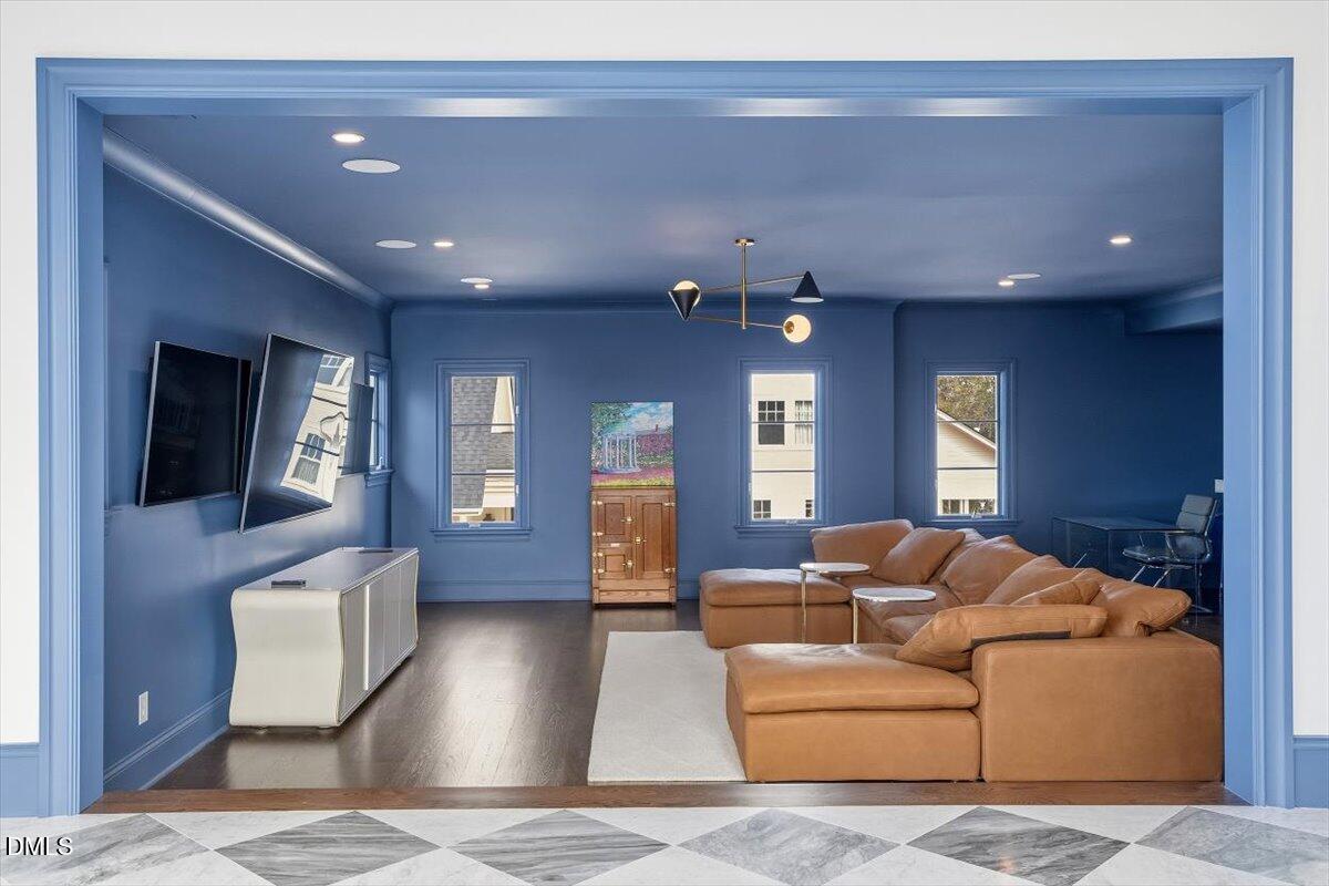 2123 St Marys Street Raleigh, NC 27608 - Photo 39 of 76 a living room with furniture and a wooden floor