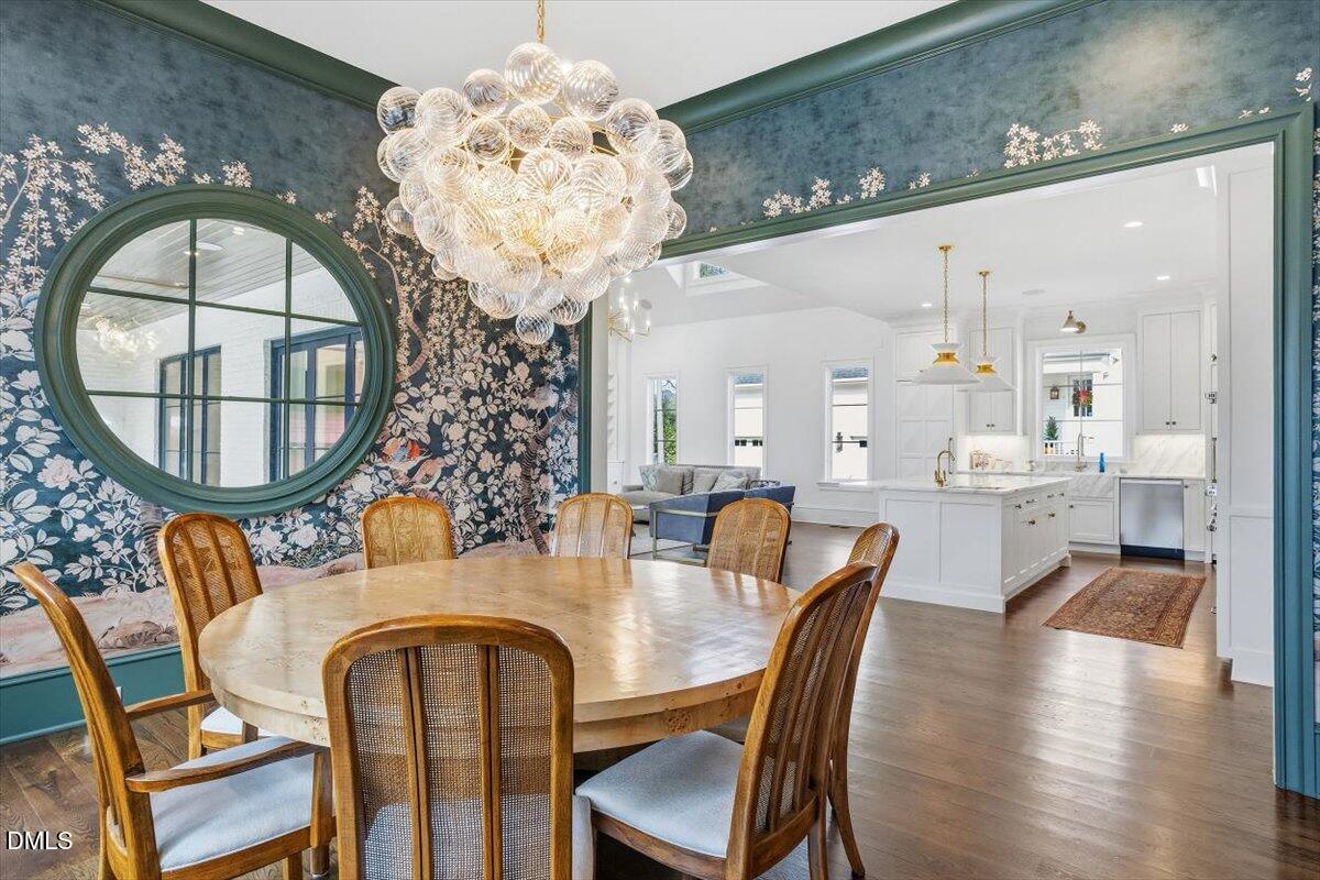 2123 St Marys Street Raleigh, NC 27608 - Photo 6 of 76 an outdoor dining room with furniture and wooden floor