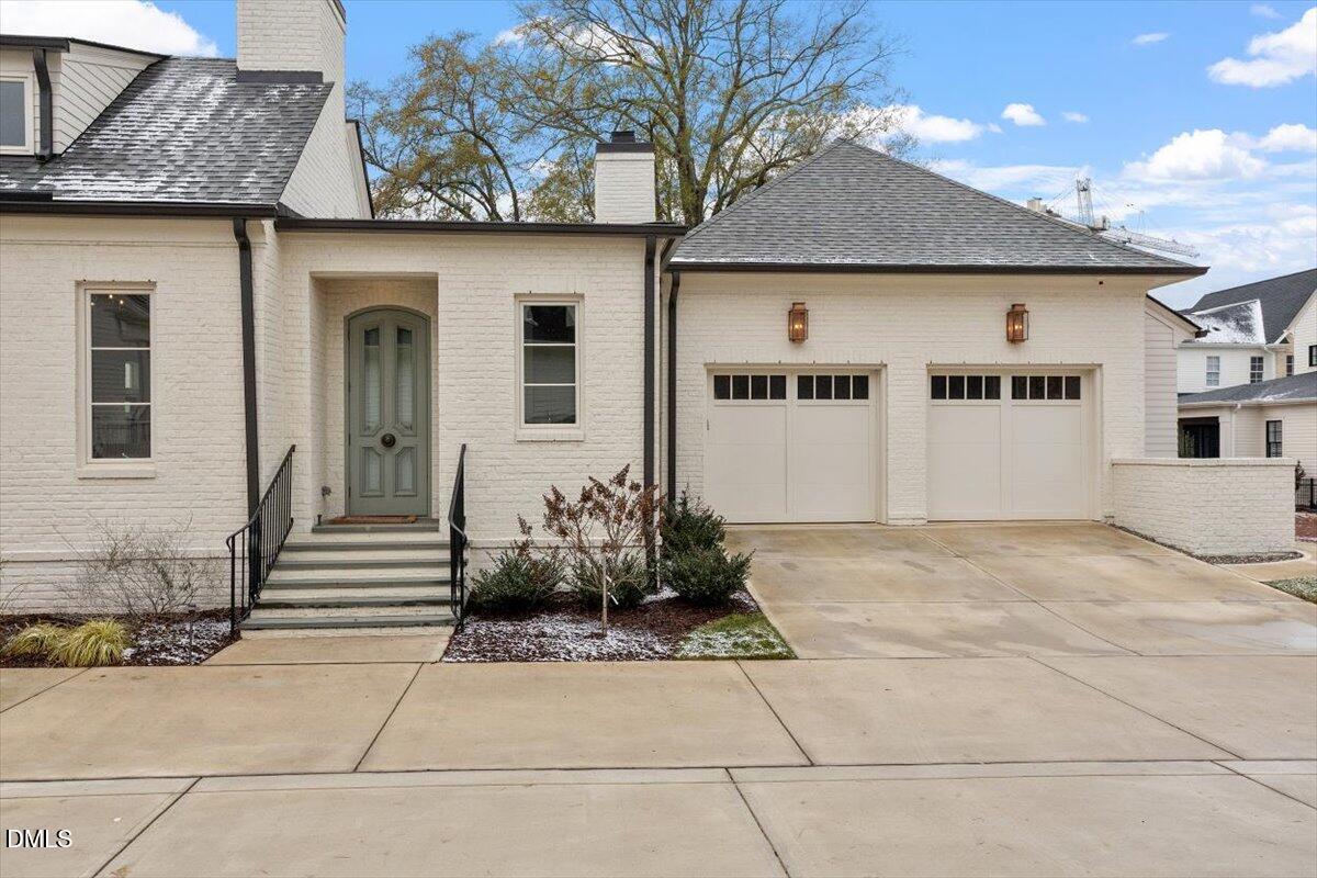 2123 St Marys Street Raleigh, NC 27608 - Photo 66 of 76 a front view of a house with garden