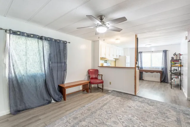 a kitchen with stainless steel appliances granite countertop a refrigerator sink and cabinets