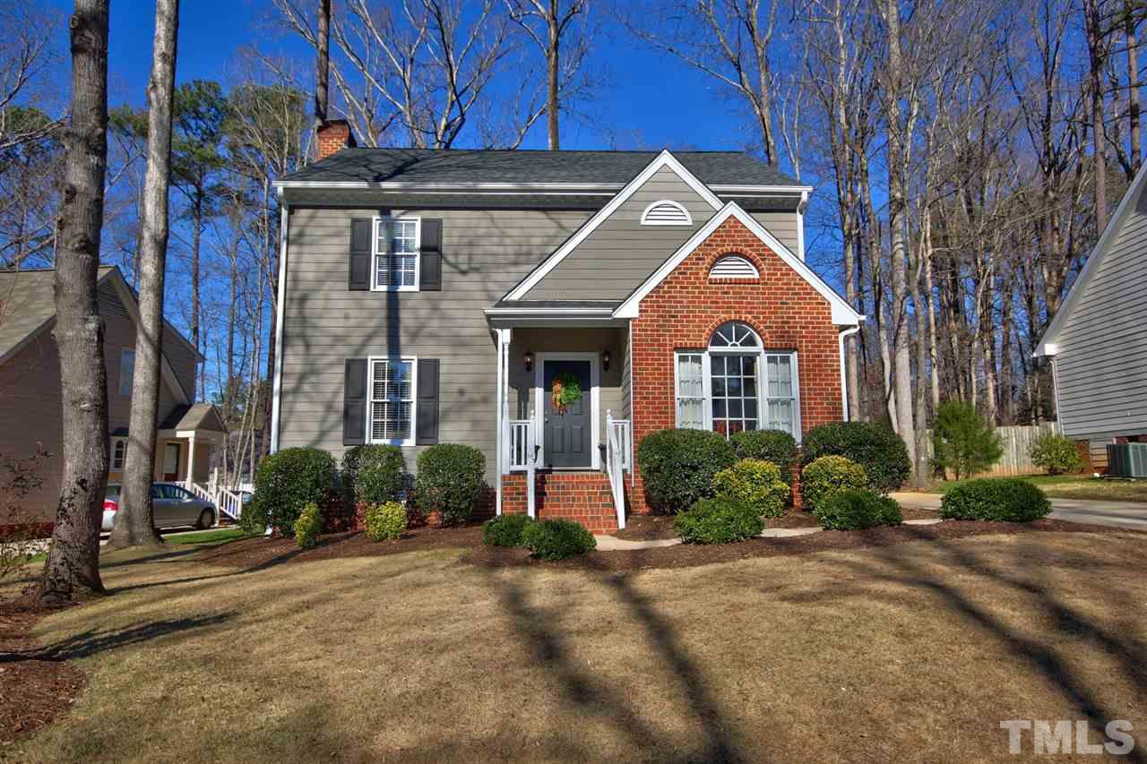 7141 Kinross Drive Raleigh, NC 27613 - Photo 1 of 19 a front view of a house with a yard
