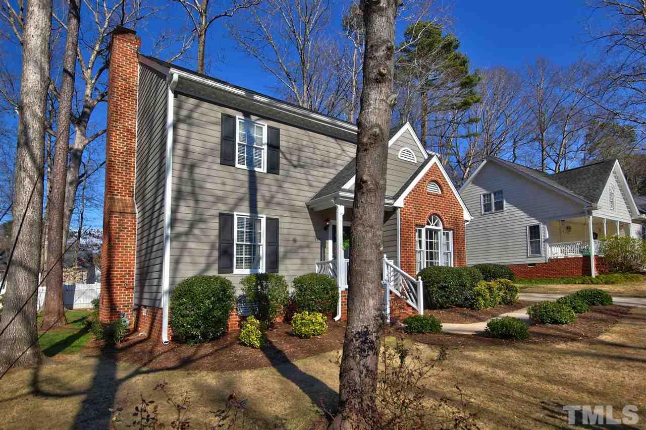 7141 Kinross Drive Raleigh, NC 27613 - Photo 2 of 19 a front view of a house with garden