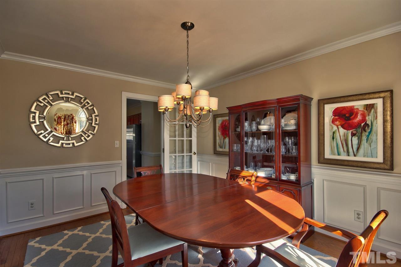 7141 Kinross Drive Raleigh, NC 27613 - Photo 9 of 19 a dining room with furniture and window