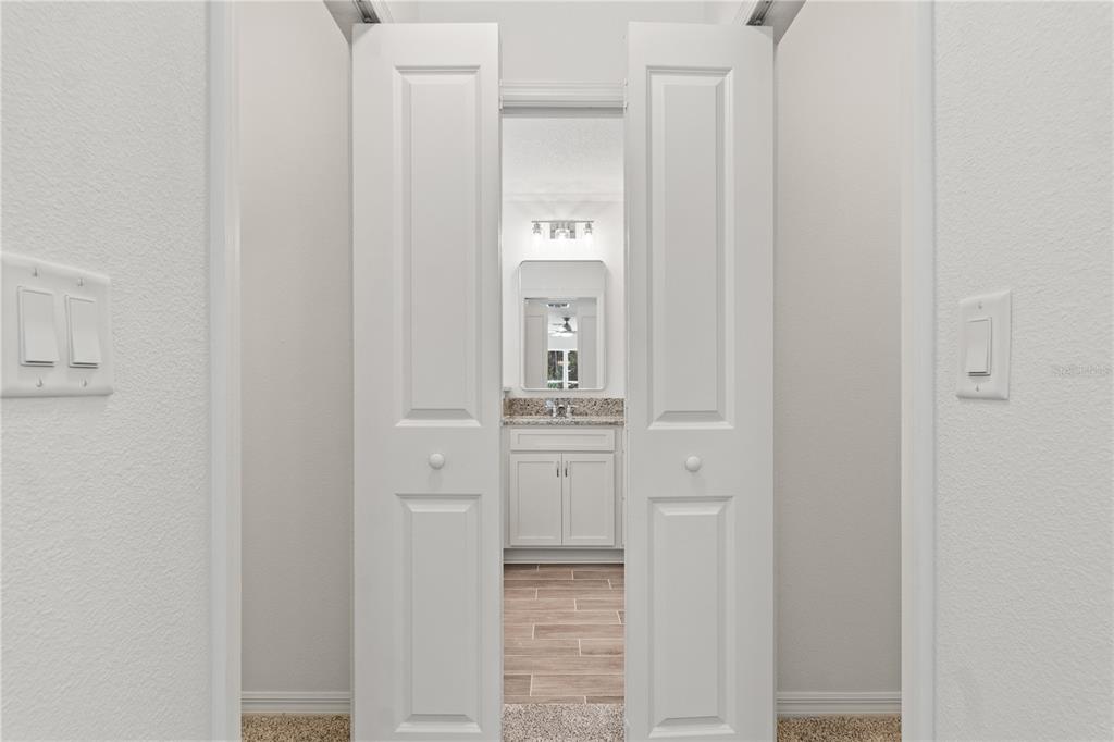 15333 Honeycreeper Road Brooksville, FL 34614 - Photo 9 of 19 a bathroom with a sink and mirror