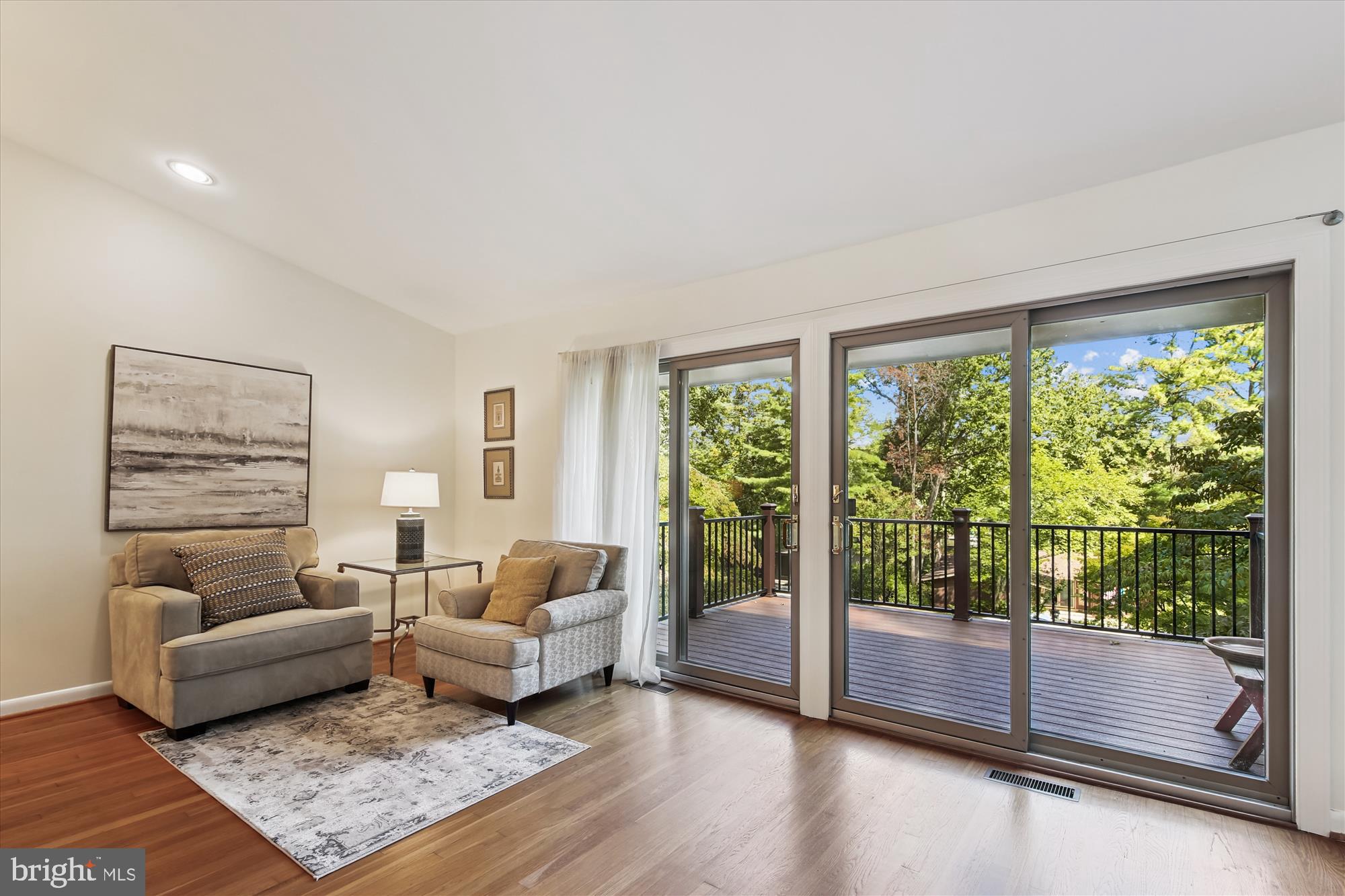11221 South Shore Road Reston, VA 20190 - Photo 11 of 61 a living room with furniture and a window