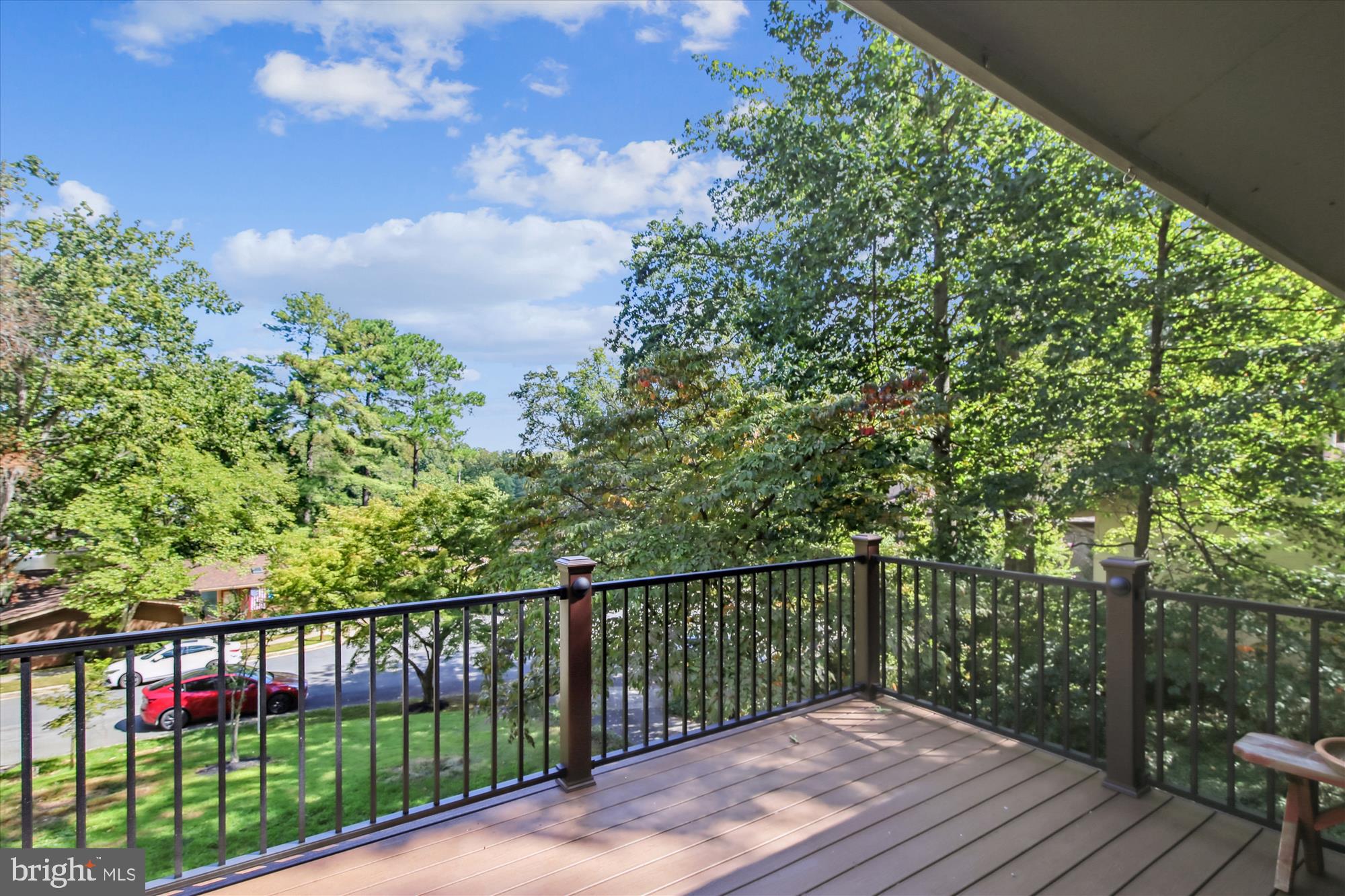 11221 South Shore Road Reston, VA 20190 - Photo 12 of 61 a balcony with wooden floor and fence
