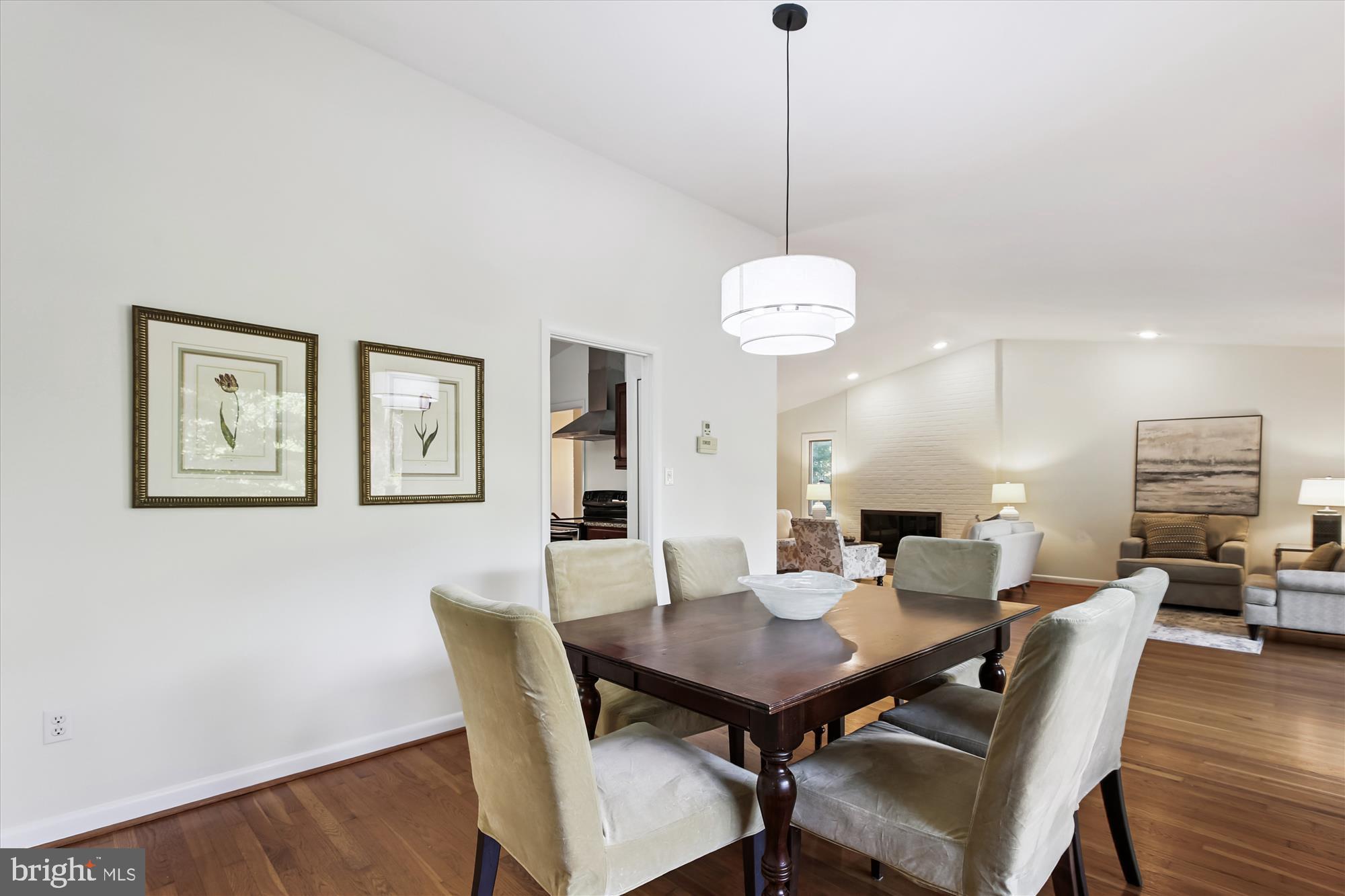 11221 South Shore Road Reston, VA 20190 - Photo 22 of 61 a view of a dining room with furniture and wooden floor