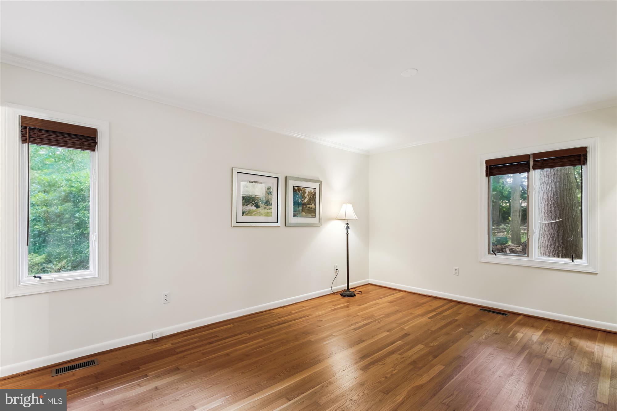 11221 South Shore Road Reston, VA 20190 - Photo 25 of 61 a view of empty room with wooden floor and fan