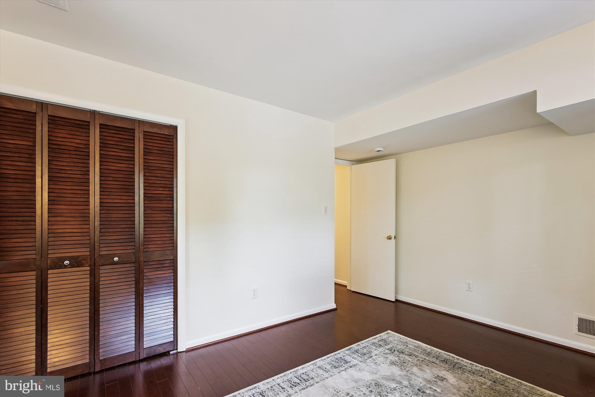 11221 South Shore Road Reston, VA 20190 - Photo 36 of 61 a view of hallway with wooden floor