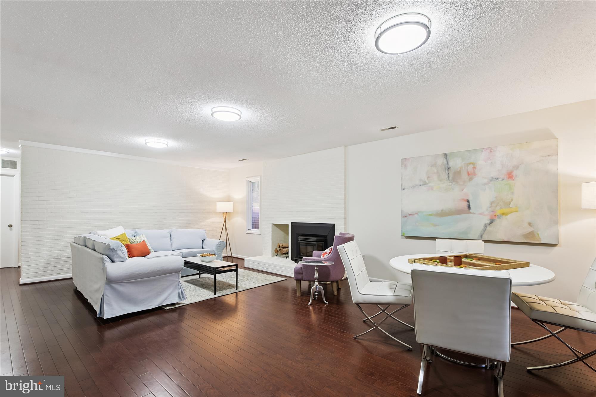 11221 South Shore Road Reston, VA 20190 - Photo 48 of 61 a living room with furniture and wooden floor