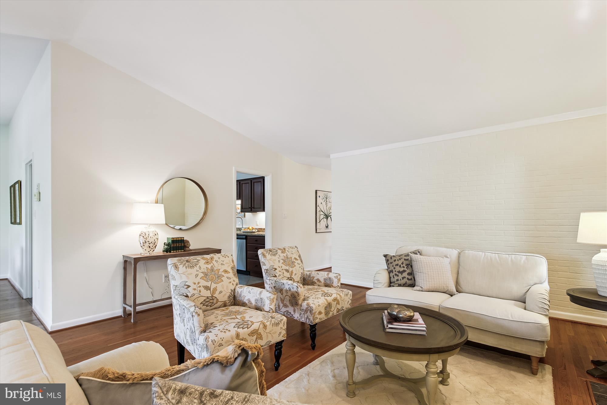 11221 South Shore Road Reston, VA 20190 - Photo 10 of 61 a living room with furniture a rug and a window