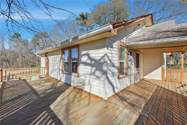 a balcony with view of swimming pool