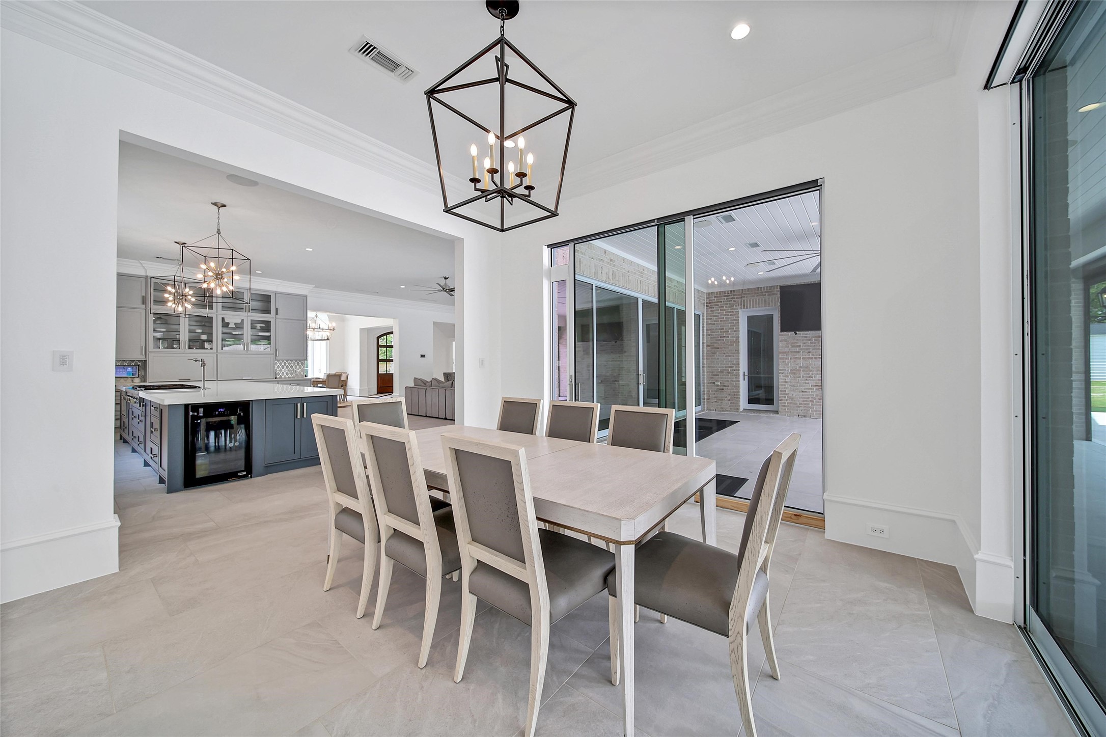 24357 East Webb Road Porter, TX 77365 - Photo 11 of 50 a view of a dining room with furniture window and wooden floor